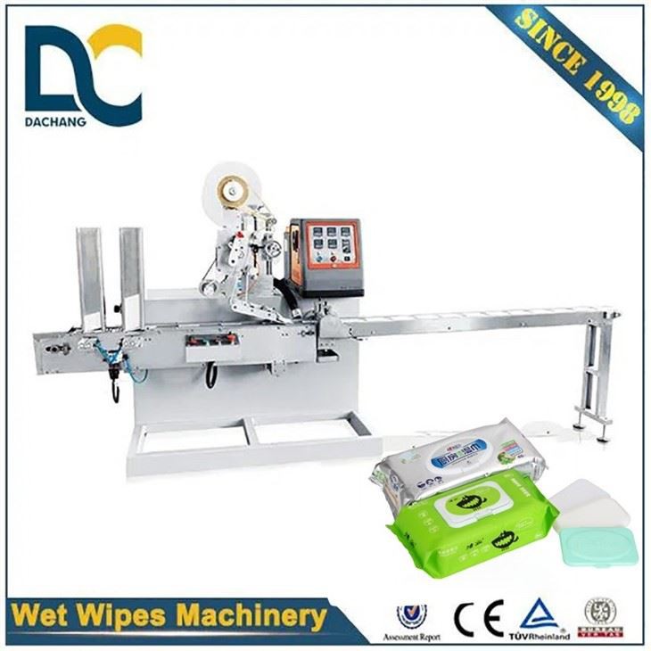 Mesin Aplikator Tutup Plastik Tisu Basah